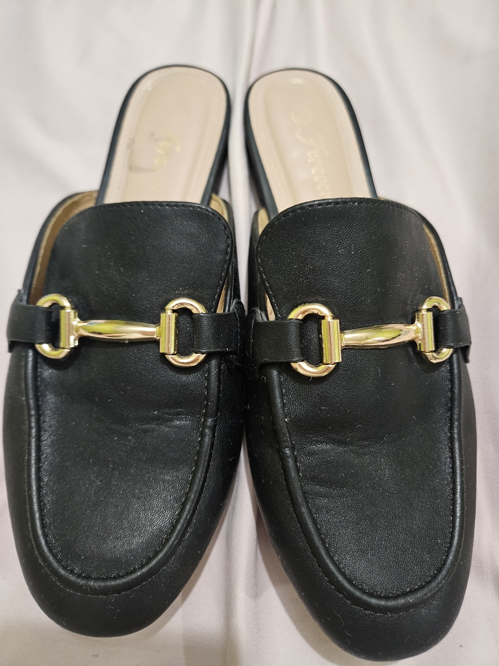 Black Slip-On Mules with Gold Bit Detail